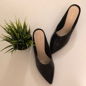 Black heeled mules by Nine West in size 10